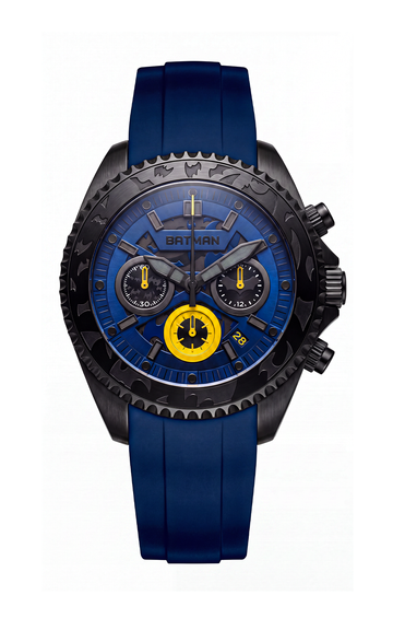 A Batman-branded chronograph watch with a black case, blue dial, and blue rubber strap, featuring yellow accents on the watch face.
