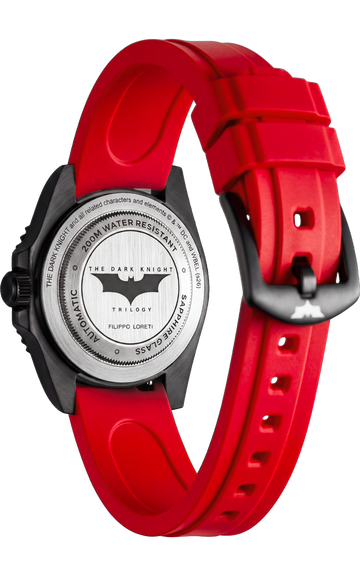 The Joker Madness caseback with red silicone strap