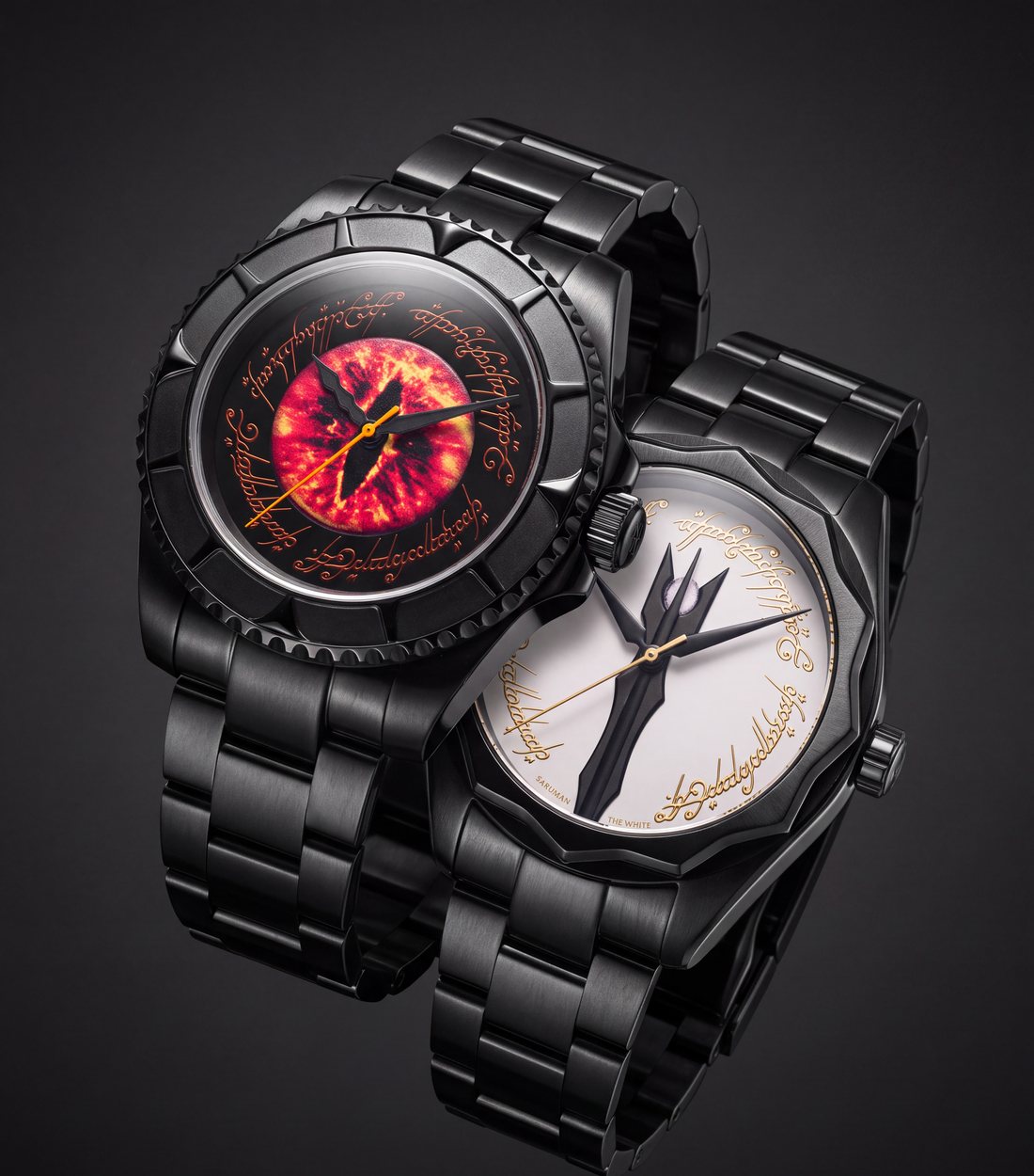 The Saruman and Sauron watches resting together, the white staff dial beside the burning Eye