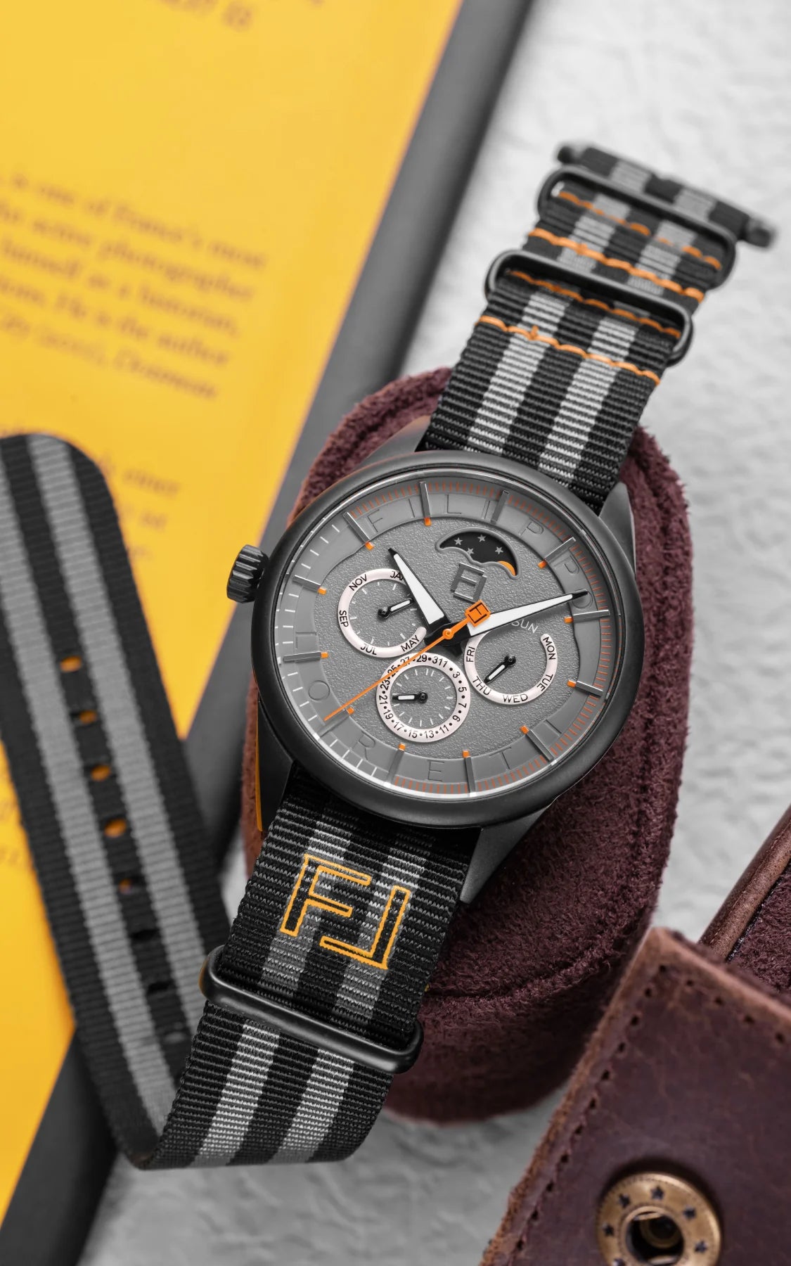 Fase Lunare Eclipse with leather accessories, lifestyle shot