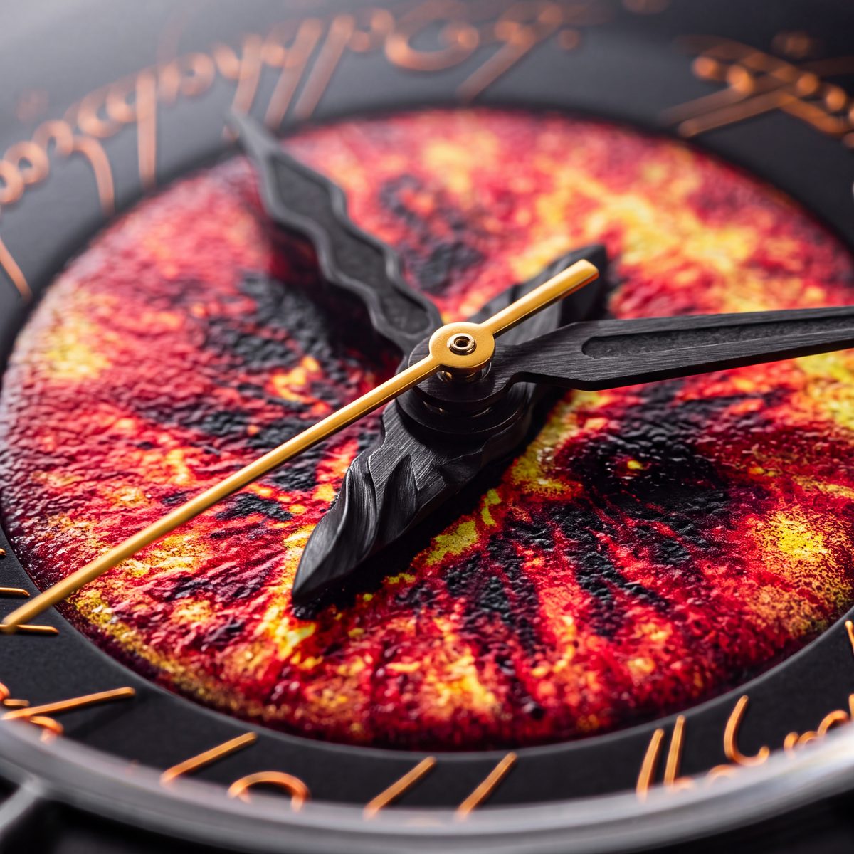 Extreme close-up of the burning Eye dial and the hands at its centre