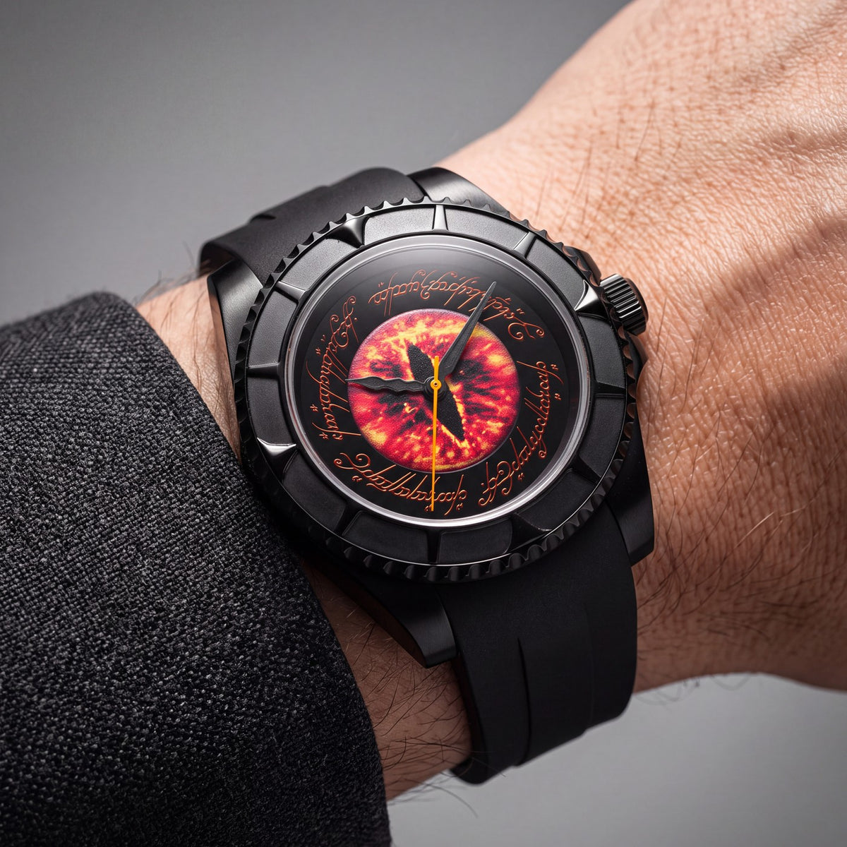 The Sauron watch worn on the wrist on its black rubber strap, the burning Eye dial seen at an angle